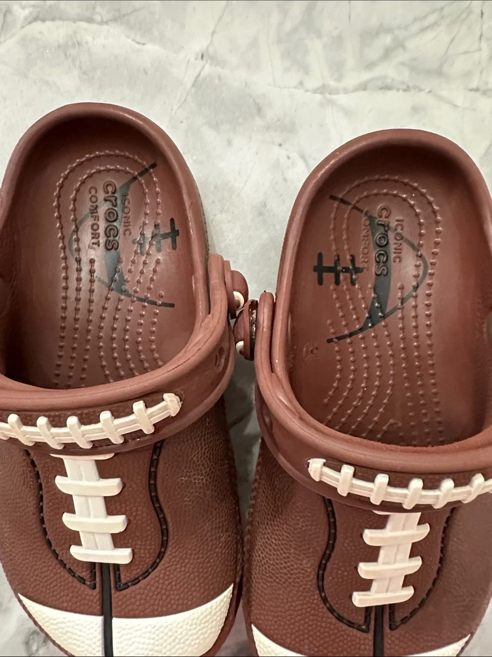 CROCS Kids Football Clog in Brown and White